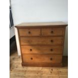 A 19TH CENTURY GOLDEN OAK CHEST OF FIVE DRAWERS, two short drawers over three long drawers on plinth