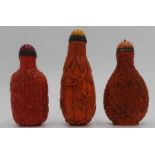 THREE CHINESE 'CORAL' GLASS SNUFF BOTTLES 19TH / 20TH CENTURY one bears an apocryphal Qianlong