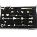 A GROUP OF STICK PINS AND OTHER ITEMS, including a gold coloured horseshoe stick pin stamped 9ct,