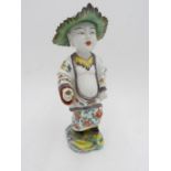 FRENCH SAMSON 'CHINOISERIE' PORCELAIN FIGURE EARLY 20TH CENTURY with painted red horn mark 23cm high