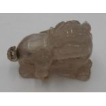 CHINESE CARVED ROCK CRYSTAL SNUFF BOTTLE 19TH / 20TH CENTURY in the form of a Buddhist lion 6.5cm