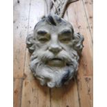 LARGE CONTEMPORARY PAINTED MASK WALL NICHE DEPICTING ATLAS WITH LENGTHS OF ROPE ATTACHED (43cm high,