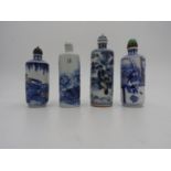 FOUR CHINESE CYLINDRICAL BLUE AND WHITE PORCELAIN SNUFF BOTTLES 20TH CENTURY one depicting an