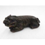 A MING DYNASTY BRONZE FIGURE OF TIBETAN LION 14cm long