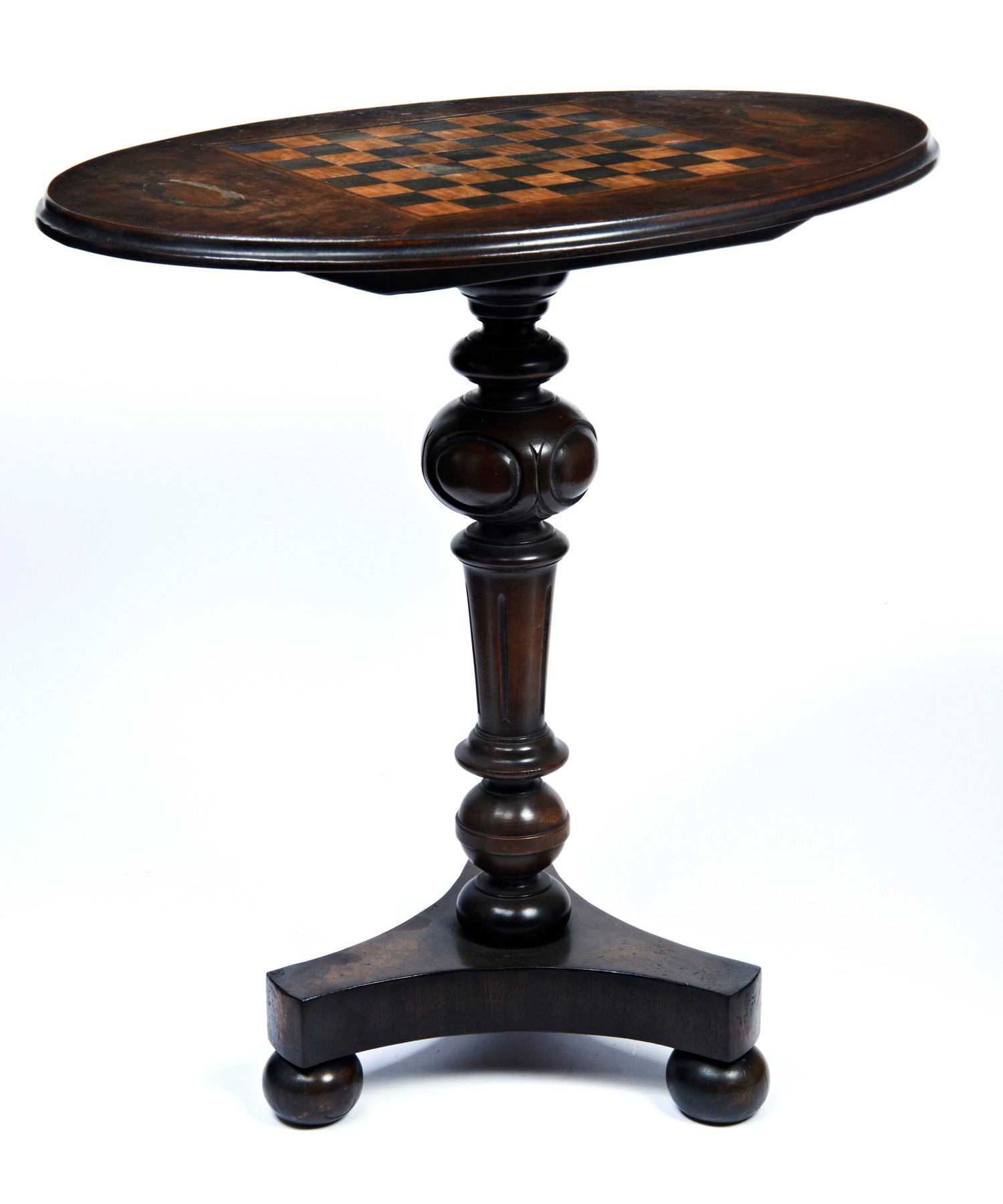 A 19TH CENTURY GAMES TABLE the oval top with chess board inlay and two shell patera, the column upon