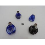 FOUR CHINESE PEKING OVERLAY GLASS SNUFF BOTTLES 20TH CENTURY one lacks a stopper largest, 8cm