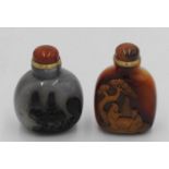 TWO CHINESE CARVED AGATE SNUFF BOTTLES 20TH CENTURY 8cm high approx.