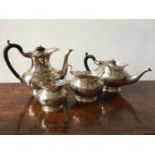 A 3-PIECE HALLMARK SILVER FRETWORK EDGE TEA SERVICE AND MATCHING COFFEE POT, Birmingham 1919.