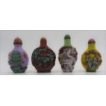 FOUR CHINESE GLASS OVERLAY SNUFF BOTTLES 20TH CENTURY largest, 7.5cm high, smallest 7cm high