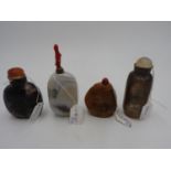 FOUR CHINESE HARDSTONE SNUFF BOTTLES 19TH / 20TH CENTURY one bears a calligraphy inscriptions