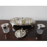 SILVER PLATED OVAL GALLERY STAND WITH CHAMBER STICK AND TWO PLATED TOP GLASS STORAGE POTS, 28cm long