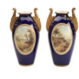A PAIR OF WORCESTER ROYAL PORCELAIN CO. (GRAINGERS & CO.) TWIN HANDLED VASES each painted with a