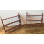 PAIR OF RED PAINTED HANGING WALL SHELVES 20TH CENTURY with fret pierced sides 67cm high, 69.5cm wide