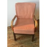 A PARKER KNOLL UPHOLSTERED ELBOW CHAIR