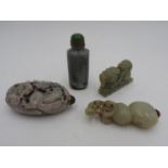 FOUR CHINESE JADE SNUFF BOTTLES 20TH CENTURY largest, 9cm high, smallest, 7.5cm high