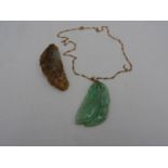 CARVED JADE PENDANT ON GOLD CHAIN AND HARD STONE PENDANT