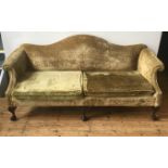 A 19th CENTURY SHAPED BACK CLAW FOOT SOFA