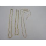 TWO GRADUATED PEARL NECKLACES WITH 9ct GOLD CLASPS, and a string of fresh water pearls