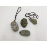 THREE CHINESE JADE 'PEBBLE' CARVINGS 20TH CENTURY together with a JADEITE PEBBLE CARVING, 20TH