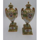 PAIR OF NORITAKE PORCELAIN VASES ON STANDS EARLY 20TH CENTURY painted with panels of brightly