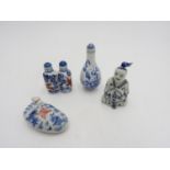 FOUR CHINESE BLUE AND WHITE PORCELAIN SNUFF BOTTLES 20TH CENTURY one bears an apocryphal seal mark