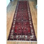 AN IRANIAN HAND KNOTTED HAMADAN RUNNER, 420 x 105cm