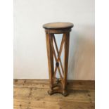 STAINED BEECHWOOD JARDINIERE STAND 20TH CENTURY in the manner of Thomas Hope 101cm high, 35cm diam