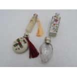 THREE HALLMARK SILVER TOP SCENT BOTTLES AND GILDED FLORAL DECORATED SCENT BOTTLE,  the three