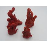 THREE CHINESE NATURAL RED CORAL SNUFF BOTTLES EARLY 20TH CENTURY together with a CARVED CHINESE