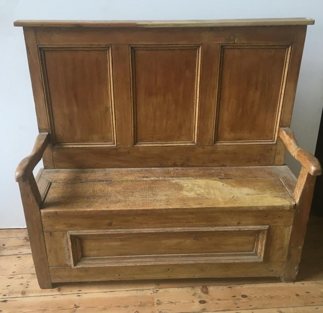 19th CENTURY WAXED PINE PANELLED SETTLE, with lift top seat with storage below 136 x 150 x 53cm
