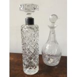 CUT GLASS DECANTER WITH HALLMARK SILVER COLLAR (30cm high) AND ONE OTHER DECANTER