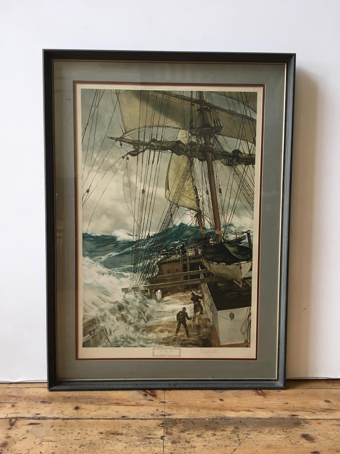 A SIGNED FRAMED PRINT BY MONTAGUE DAWSON TITLED THE RISING WIND 91CM HIGH X 61CM WIDE