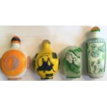 FOUR CHINESE PEKING OVERLAY GLASS SNUFF BOTTLES 20TH CENTURY one lacks stopper largest, 9cm high,