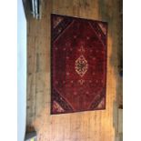 AN IRANIAN HAND KNOTTED HAMADAN MEDALLION PATTERN RUG, 245 x 160