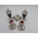 A PAIR OF HALLMARK SILVER WIRE WORK CRUETS AND A PAIR OF SMALL SILVER CANDLESTICKS and a square