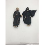 A HANDMADE PAIR OF VINTAGE DOLLS IN EASTERN CLOTHING 28cm high