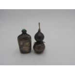 TWO CHINESE SILVER SNUFF BOTTLES 20TH CENTURY 8cm & 6cm high