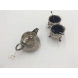 A PAIR OF HALL MARK SILVER SALTS (Birmingham, 1900) AND A VICTORIAN SILVER CREAM JUG (Sheffield,