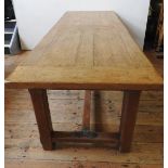 A FRENCH 19th CENTURY OAK FARMHOUSE TABLE, with two side drawers and stretcher bar supporting square