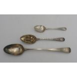 A GEORGIAN HALL MARK SILVER BASTING SPOON, AN ORNATE FRUIT DECORATED HALLMARK SILVER SERVING SPOON