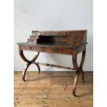 A VERY GOOD QUALITY REPRODUCTION YEW WOOD LEATHER TOP WRITING DESK, with 8 small stationary
