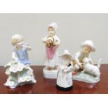THREE ROYAL WORCESTER FIGURES OF CHILDREN AND NUN CANDLE SNUFFER, 'May', 'Polly put the kettle on'