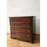 A ROSEWOOD CROSSBANDED GRADUATED CHEST OF FOUR DRAWERS 83 x 91 x 50cms