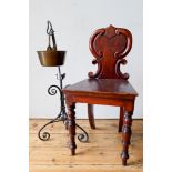 A VICTORIAN MAHOGANY PANEL BACK HALL CHAIR AND BRASS PRESERVE PAN ON WROUGHT IRON STAND, the chair