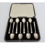 A SET OF EIGHT HALLMARK SILVER TEA SPOONS, in fitted case, Birmingham, 1938, 1.8oz