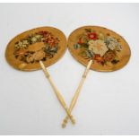 TWO VICTORIAN PETIT POINT EMBROIDERED HAND SCREENS LATE 19TH CENTURY with turned ivory handles