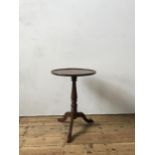 A GEORGE III MAHOGANY TRIPOD TABLE ON TURNED PEDESTAL, 70cm high, 51cm dia