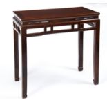 ELM ALTAR TABLE LATE QING DYNASTY the floating panel top above an open apron, raised on corner