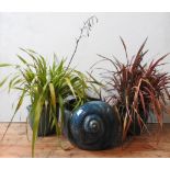 A TURQUOISE GLAZED CONCH SHELL SHAPED GARDEN PLANTER AND TWO OTHERS