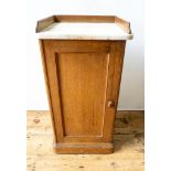 A VICTORIAN OAK MARBLE TOP POT CUPBOARD